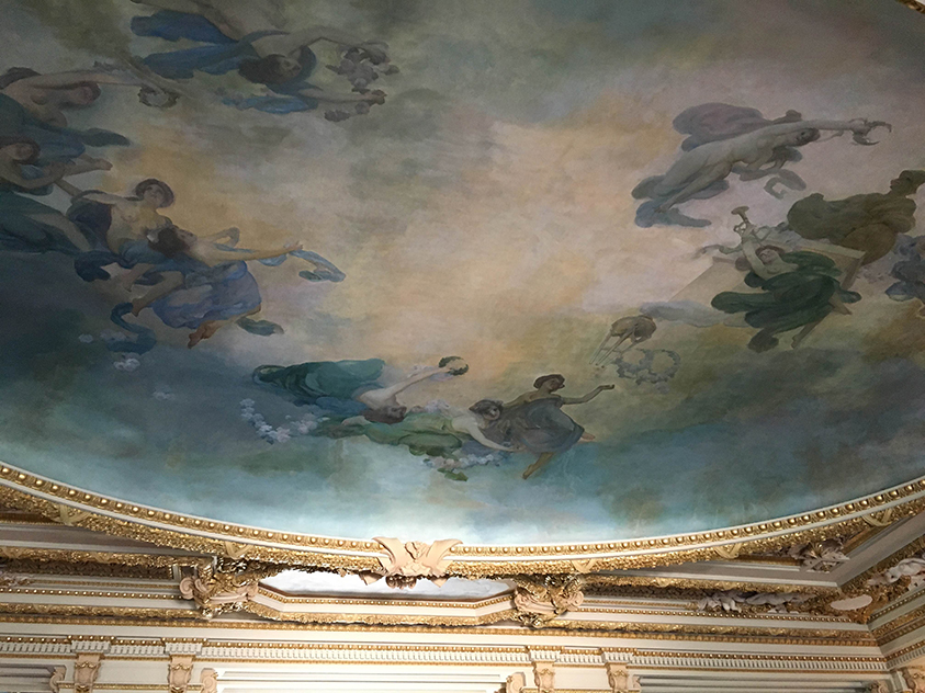 Hand-painted canvas ceilings mimic the work of Michelangelo.