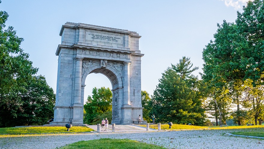 A triumphal arch in a park in Valley Forge & Montgomery County.