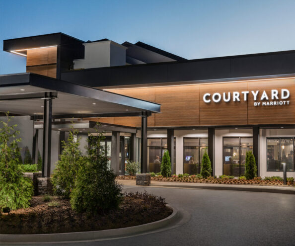 The new look for Courtyard by Marriott, with modern wood paneling and dark colors