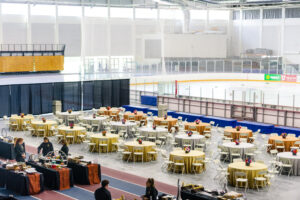 Tables and chairs arranged on the side of Olympic Ice Oval in Utah