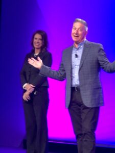 Caroline Beteta and Joe D'Alessandro standing onstage