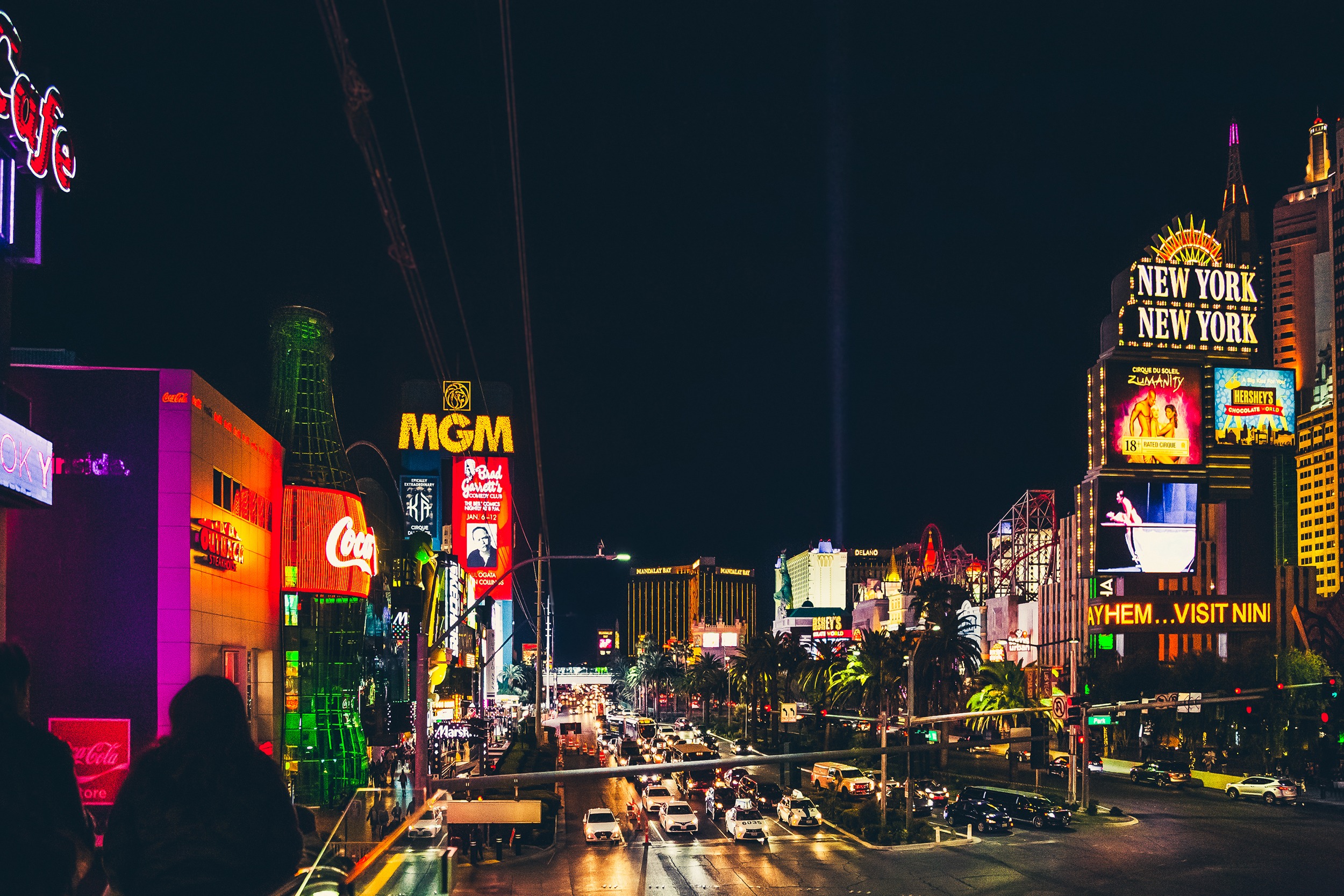 An intersection of the Las Vegas Strip at night. 