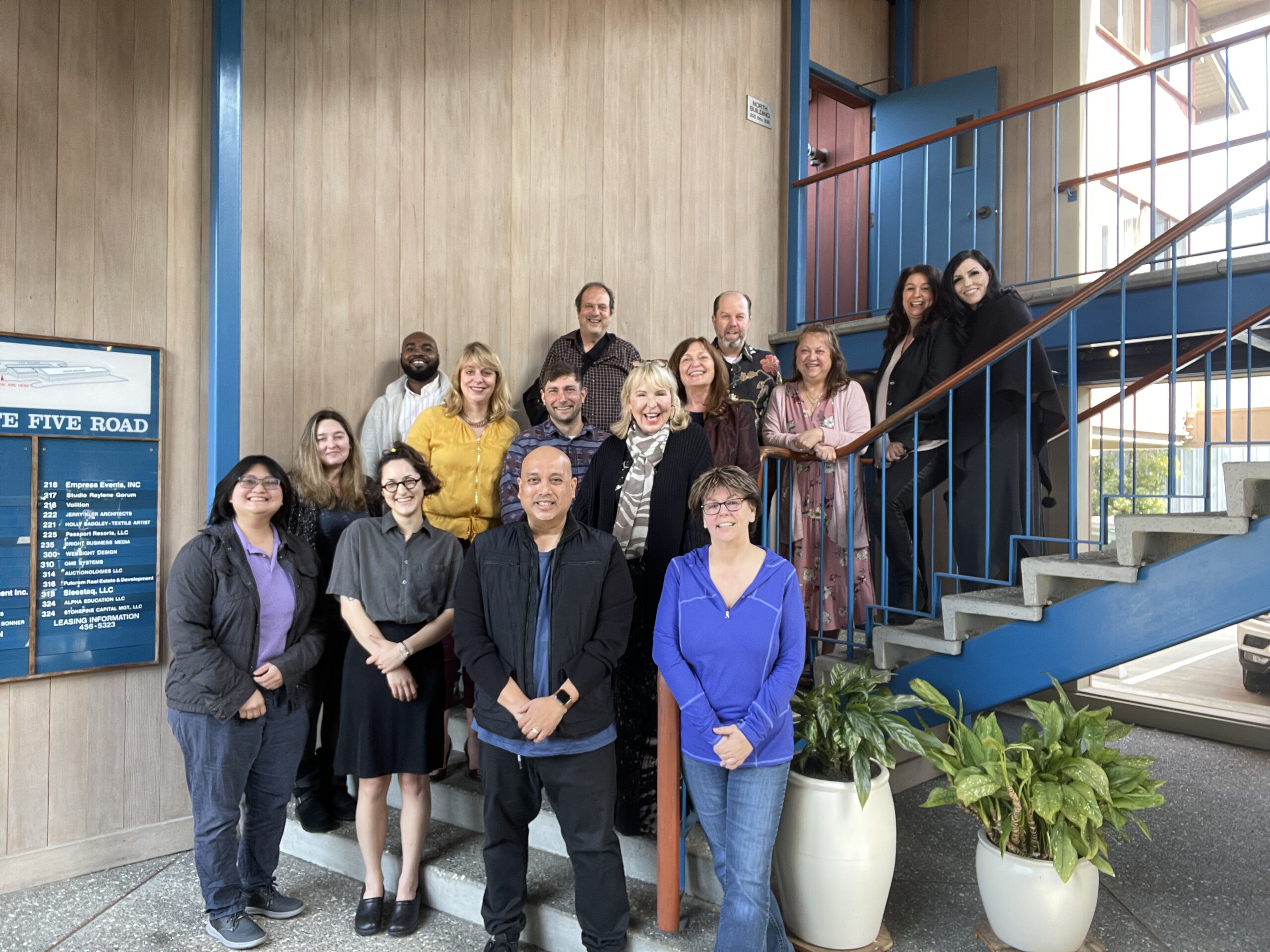 A group picture of the in-office staff at Smart Meetings.