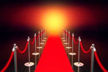 A CGI image of a red carpet with ropes on either side,