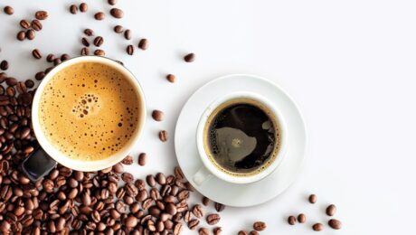 Two cups of coffee on a white background