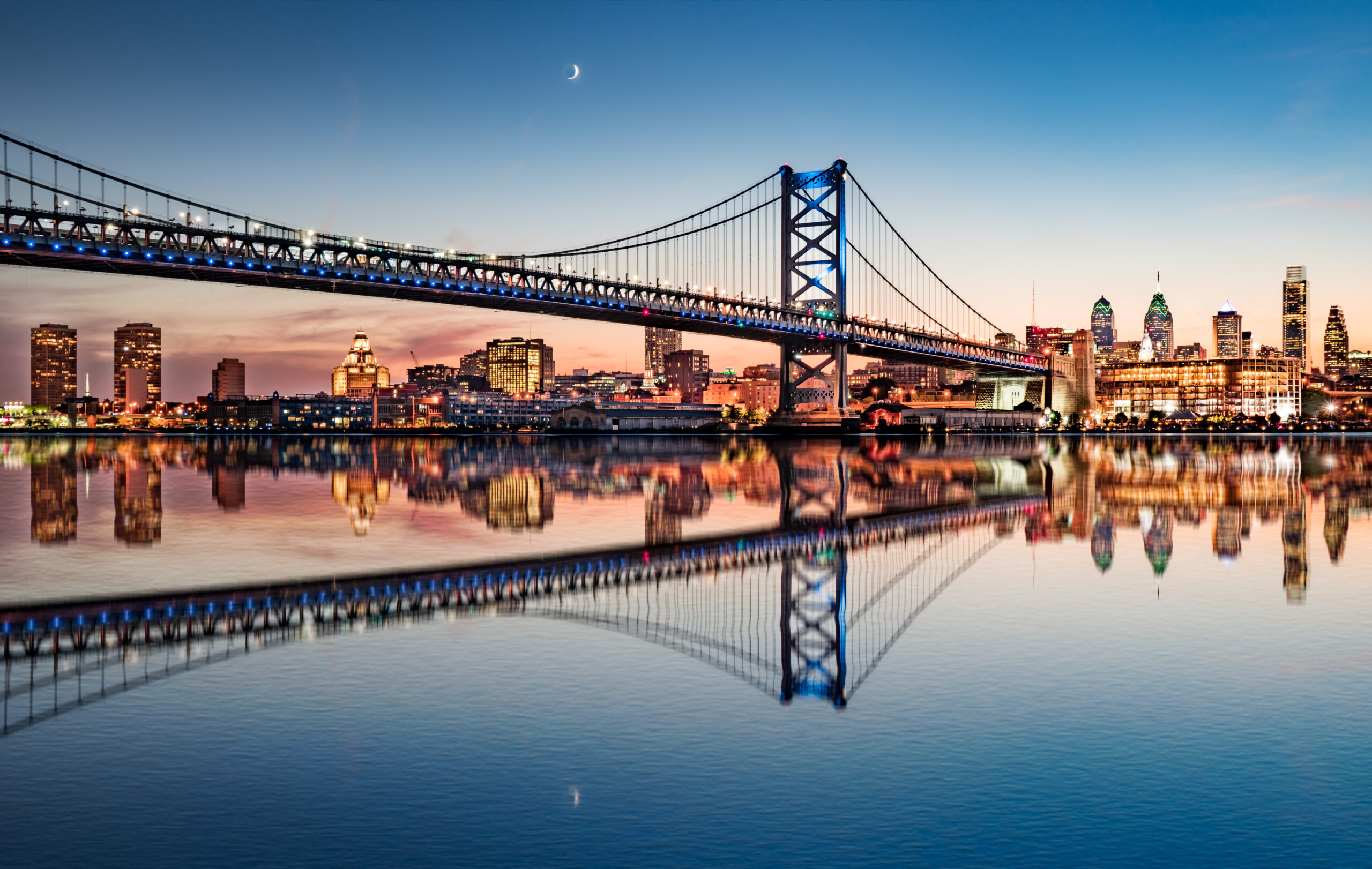 Philadelphia night skyline and Ben Franklin Bridge along the Delaware River