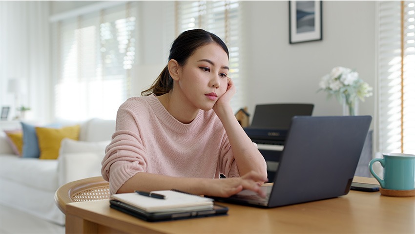 woman on laptop at work