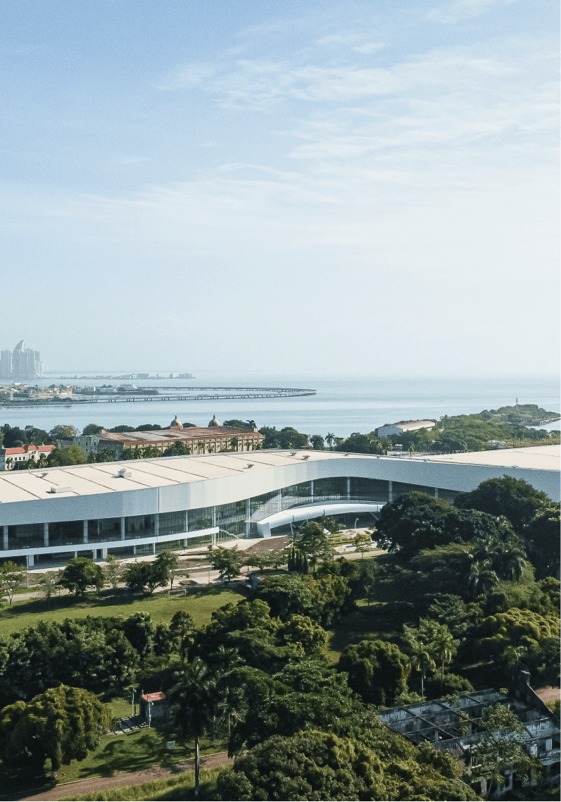 aerial view of panama convention center with ocean in background