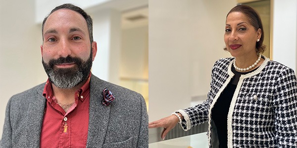 daniel treuman on left wearing light grey blazer and red dress shirt and tanya hamel on right wearing black and white dotted jacket and black top