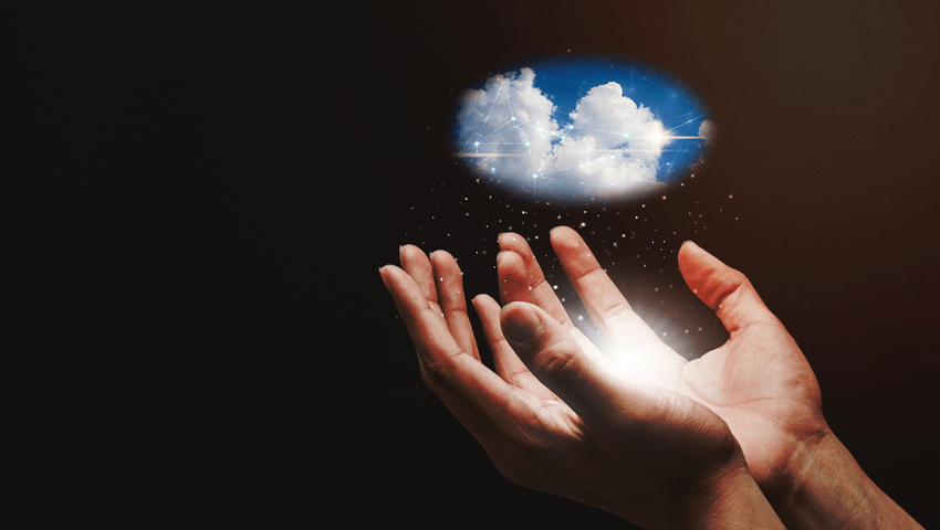 a small image of clouds floating in someone's hands