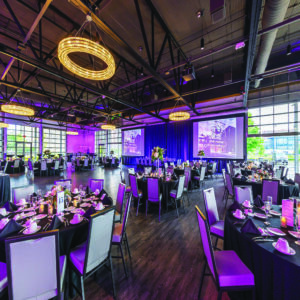 venue in Harley-Davidson Museum lit by purple lights
