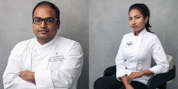 Indrajit Suryawanshi on left and Soumi Hazra sitting on right, both are wearing long sleeve chef shirts