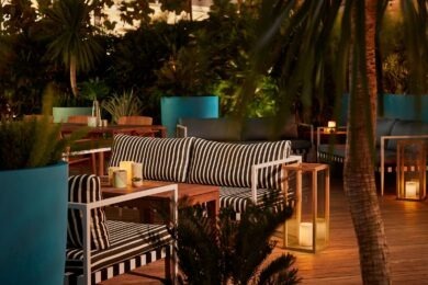 outdoor space at night at The Gates Hotel South Beach