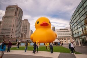 large yello inflatable rubber duck in park