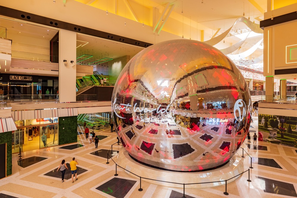 interior of hotel, large globe in center of lobby