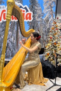 Harpist at Visalia Booth at CalSAE Seasonal Spectacular 2023